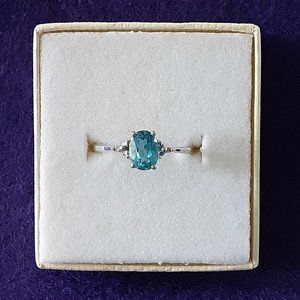 White Gold Ring With a Blue Stone